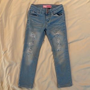 Girls distressed skinny jeans
